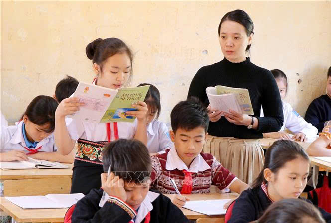 Giờ học âm nhạc của học sinh Trường phổ thông Dân tộc nội trú THCS huyện Tân Sơn, tỉnh Phú Thọ. Ảnh tư liệu: Trung Kiên/TTXVN